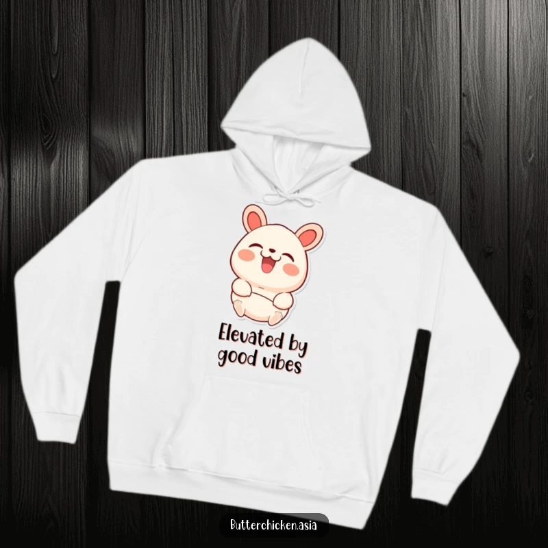 Funny bao bun hoodie showing a beaming character with a joyful expression as it is picked up.