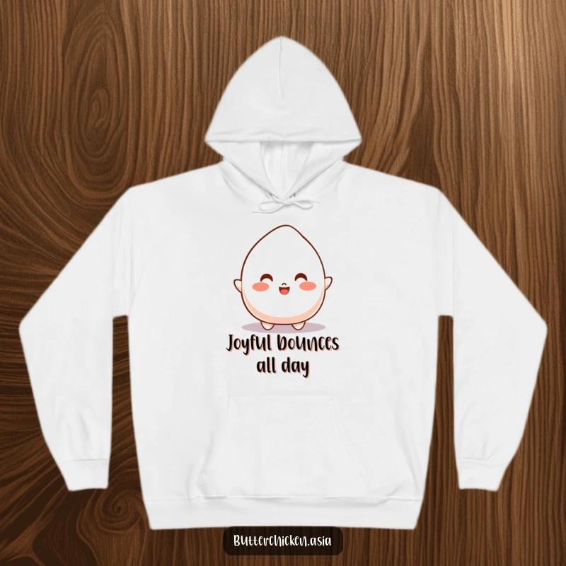 Funny Hoodie displaying a bouncy mochi character in a joyful leap, perfect for staying warm and energized.